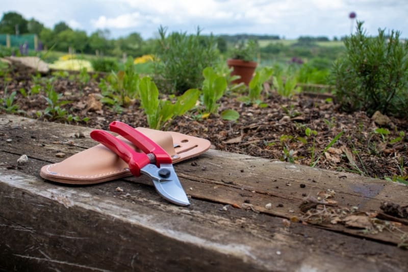 130DX secateurs with red grip